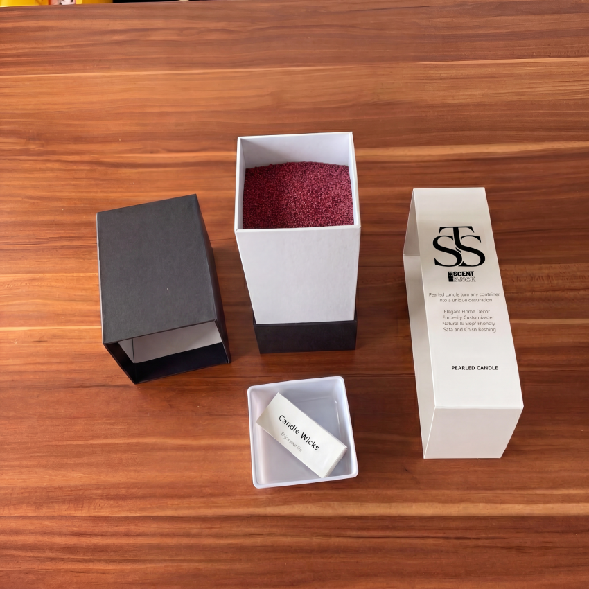 Unboxed Drunken Pash — wine-red pearls in the white inner box, with lid, sleeve and wick box